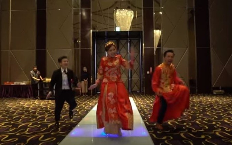 婚禮就要這樣玩  新人顛覆傳統穿龍鳳掛大跳「韓國洗腦舞」一鏡到底拍攝嗨翻全場